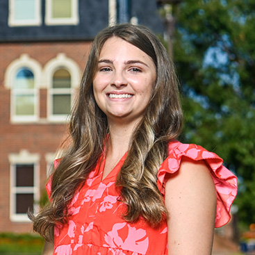 Gracey Avery outside of Hale Hall