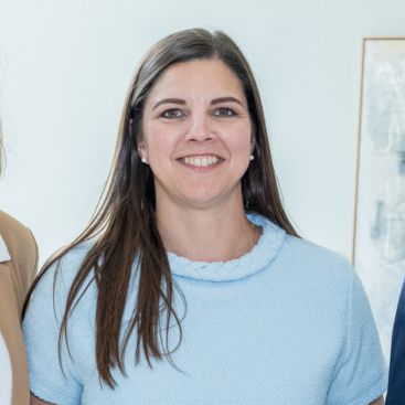 Angelle Bertrand David with Ginger Laurent and Chris Martin at the School of Banking graduation ceremony