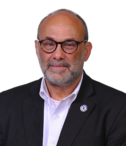 Headshot of Tom Bishop on a white background