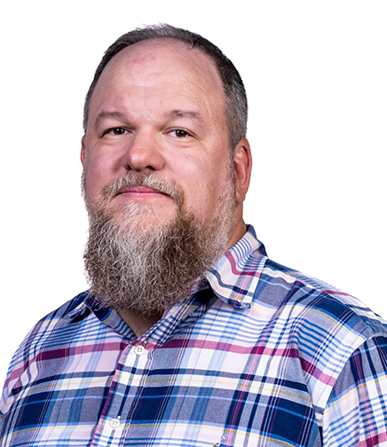 Headshot of Matthew Hartmann on a white background