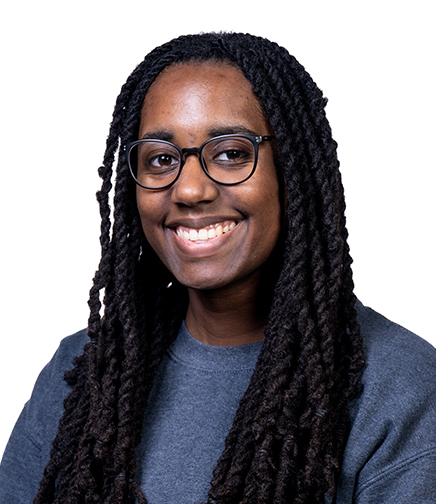 Headshot of Nia Collins on a white background 