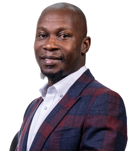 Headshot of John Dogbey on a white background