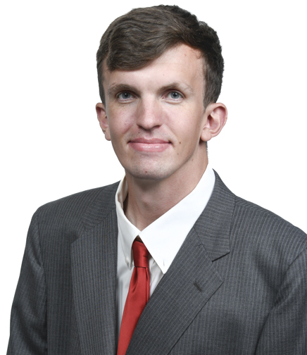 Headshot of David Hufziger on a white background