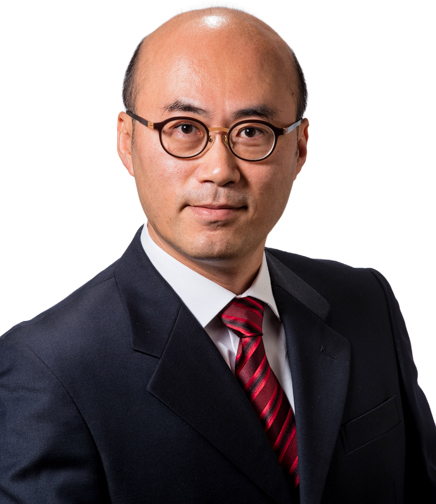 Headshot of Min Manki on a white background
