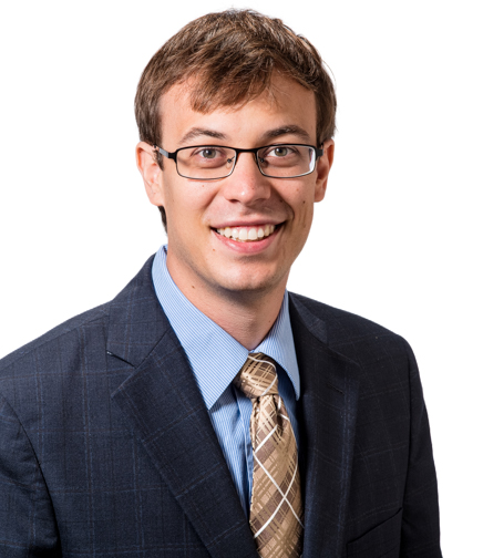Headshot of Andrew Peters on a white background