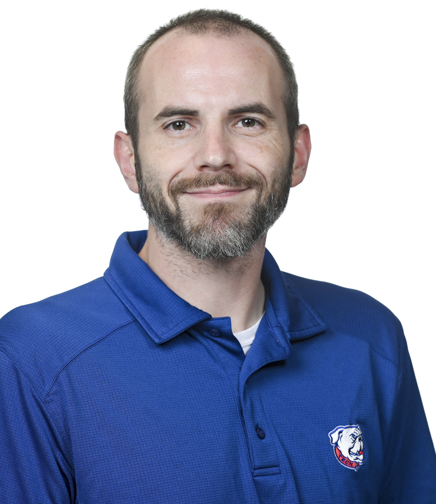 Headshot of Benjamin Quinnelly on a white background