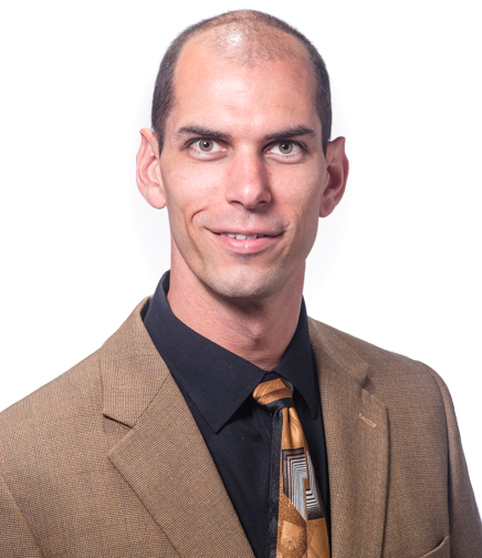 Headshot of Timothy Reeves on a white background