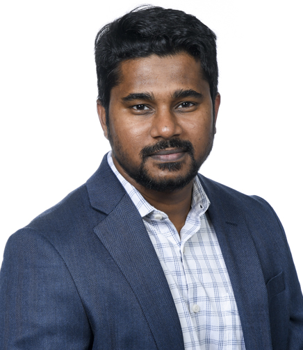 Headshot of Hussain Shaik on a white background