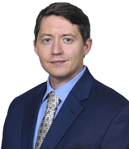 Headshot of Andrew Stroud on a white background
