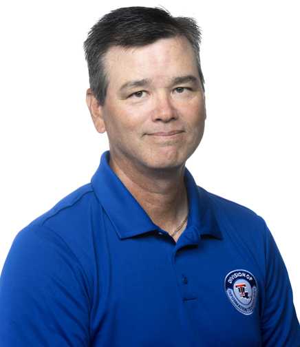 Headshot of Chris Womack on a white background