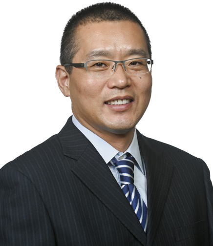 Headshot of Junhai Xu on a white background
