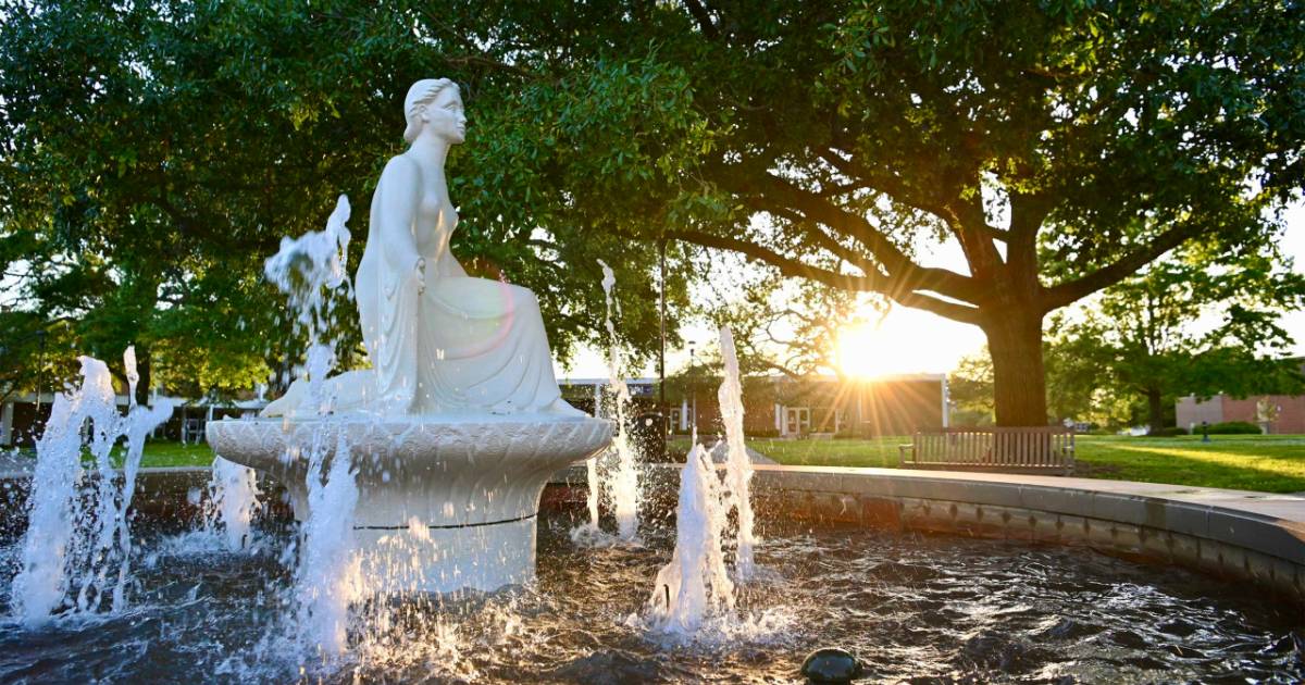 The Lady of the Mist sculpture and fountain at sunrise
