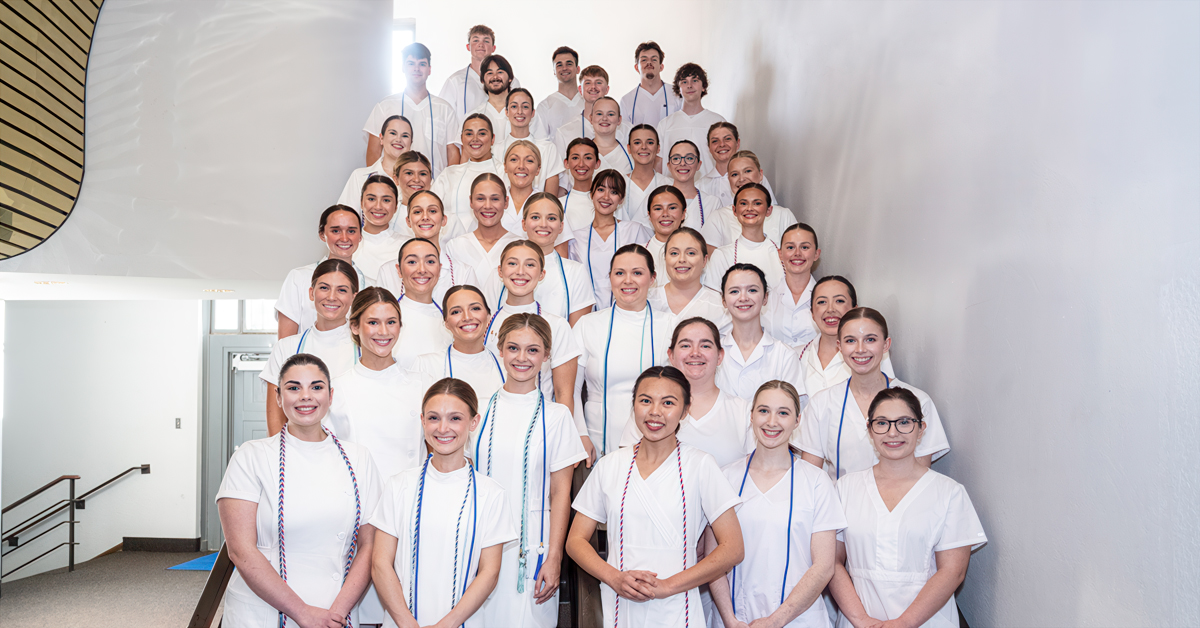A group photo of Louisiana Tech's Spring 2026 Nursing graduates with their graduation cords.
