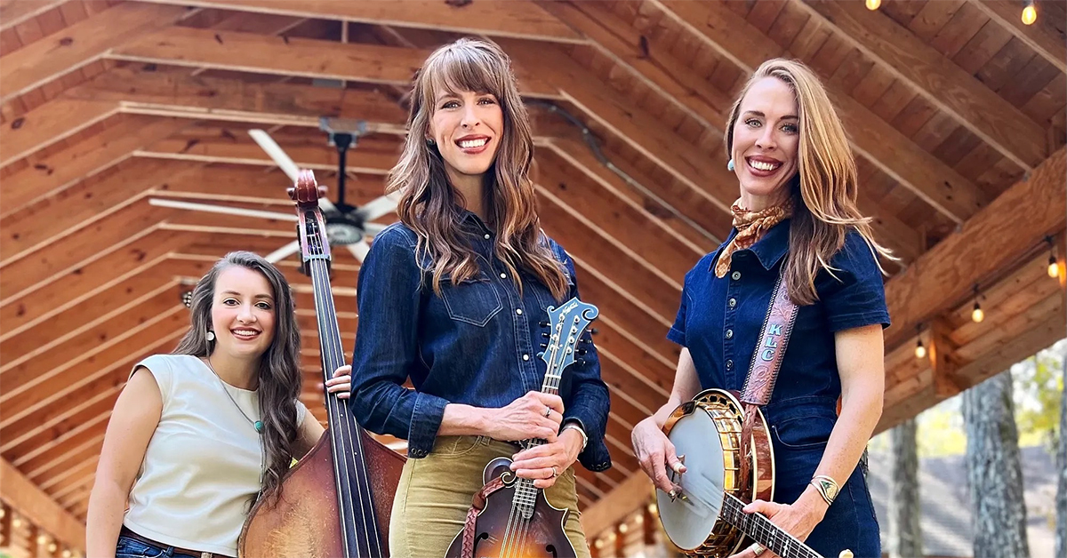 Three women in the Purple Hulls band