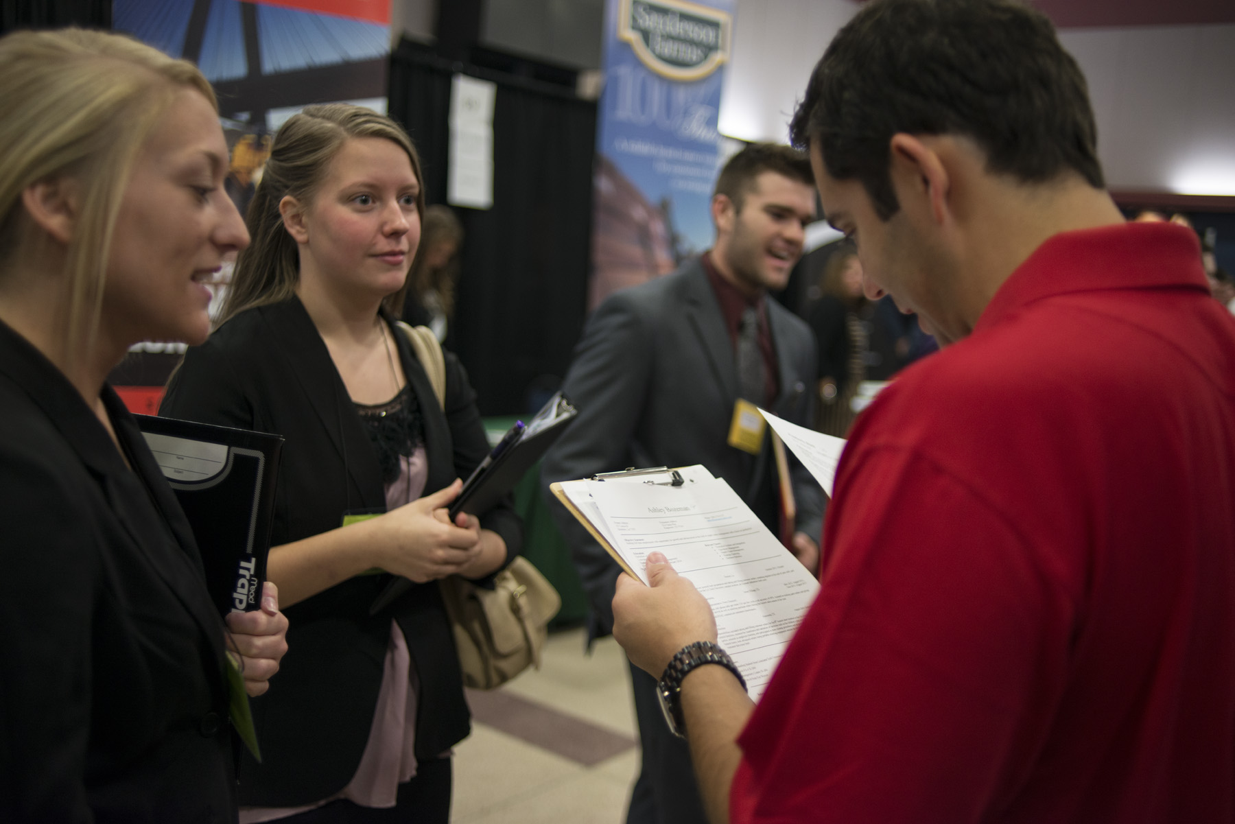Supply chain management majors Kimberly Duck and Ashley Bozeman, along with Ronnie Huckaby Jr. a mechanical engineering major, interview with Exxon/Mobil representatives.