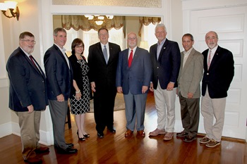 From left: Dr. Mark D. Gibson, Roy O. Martin, III, Carole Martin Baxter , Dr. Les Guice, Jonathan Martin, Scott Poole, Mikey Rachal and Dr. James D. Liberatos took time to pose for a picture together during reception at the Ropp Center.
