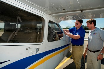 Louisiana Tech Professional Aviation student, instructor conduct pre-flight inspection