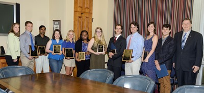 Louisiana Tech President Les Guice (far right) Dr. Melinda Bryan (far left) and the 2014 Undergraduate and Graduate Research Symposium winners.