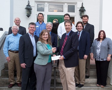 Jennifer A. Johnson (front left) and Dr. Hisham Hegab (front right) are joined by faculty from the College of Engineering and Science and representatives from ExxonMobil for the check presentation.