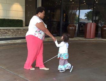 Sheena Manuel works with a blind student at a north Louisiana school.