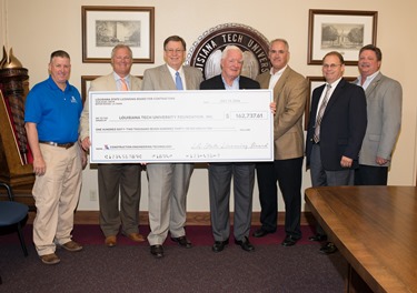 From L-R: Clint Graham (Lincoln Builders), Ken Naquin (LA AGC), Louisiana Tech President Les Guice, Vic Weston (Contractor’s Education Trust Fund), Michael McDuff (LA State Licensing Board for Contractors), Scott Couper (Association of Building Contractors) and Steve Terrill (LA AGC).