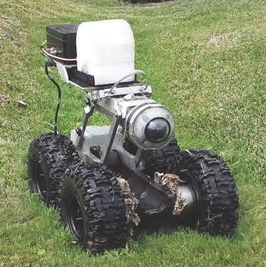 Underground pipe inspection vehicle uses ultra-wide band (UWB) pulsed radar technology developed at Louisiana Tech University to detect fractures, quantify corrosion and determine the presence of voids in the surrounding soil.