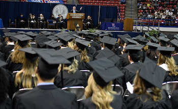 CenturyLink executive Bill Bradley speaks to 268 graduates during Louisiana Tech’s fall commencement ceremony Saturday.