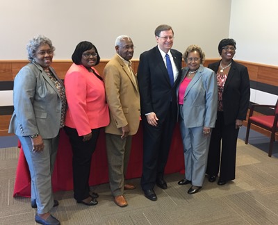 Louisiana Tech President Les Guice (third from right) with Bertha Bradford-Robinson (second from right) and family.