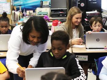 Angela Byrd, foreground, and Kerrigan Pettis, background, help third grade students learn to use an online math program at Sallie Humble Elementary in Monroe on Tuesday, Nov. 15, 2016. Byrd, who is in her 30th year of teaching, is Pettis' mentor. Pettis, a senior at Louisiana Tech, is one of three clinical teaching residents at Sallie Humble, spending the entire year co-teaching with Byrd, rather than only spending 12 weeks in a traditional student teacher program. - Photo Courtesy of News-Star.