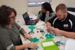 Missy Wooley, Educational Consultant for the Louisiana Department of Education, works with colleagues from across the nation using arduinos during the three-day national ITEEA training at Louisiana Tech's SciTEC in the College of Education.