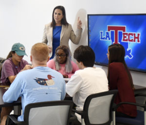 Stacy Gilbert leads a tutoring session.