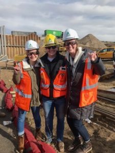 Katya Opel (left) and Chloe Wallace (right) with Louisiana Tech graduate and Kiewit employee Mallory Walters.