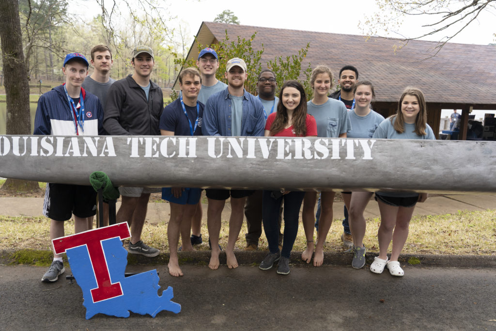 Louisiana Tech Concrete Canoe team members and former members are (pictured from left) Noah Perkins, current ASCE member; Seth Garner, lead canoe captain; Josh Ridley, racing captain; Reed Edwards, construction/racing team; Miller Boyd, ASCE officer; Arthur Baldwin, lead canoe captain; Gabe Clottey, construction team; Allie Thurman, ASCE/AISC President; Katya Opel, ASCE/AISC VP and canoe aesthetics captain; Tracey Stephens, alumni; Lannie Skelly, racing team; and  Sydney Bratton, ASCE officer.