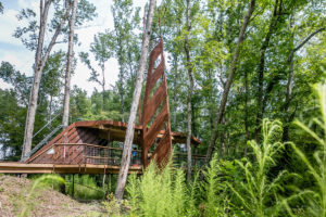 The most recent collaboration between Louisiana Tech and MedCamps includes a tree house and zip line.