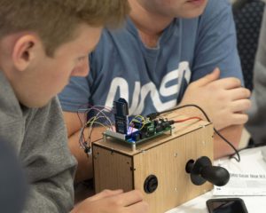 Students work on their gadgets during the STEM day.