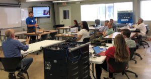 Michael Swanbom kicks off the project with a seminar for teachers and administrators of participating schools.