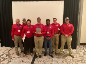 Team Coach, Reggie Jeter, with the Estimating team members Kyle Conrad, Brice DiVincenti, Jacob Finley, Bryan Grigsby, Todd Wilson, and Bud Allen.