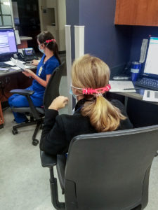 Nurses wear the ear guards Barras manufactured.