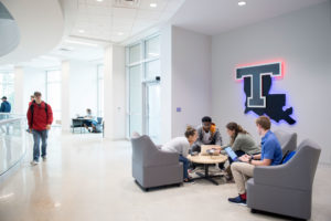 Students work together on engineering projects in the Integrated Engineering and Science Building.