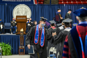 high fives at commencement