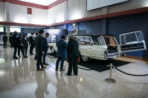 Members of the first class of Reginald F. Lewis Scholars examine the hearse that carried the body of MLK to his final resting place.