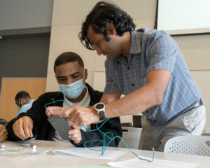 Students learn how to use their cell phones to measure electromagnetic waves. 