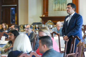 Dr. Sumeet Dua stands amongst research faculty members.