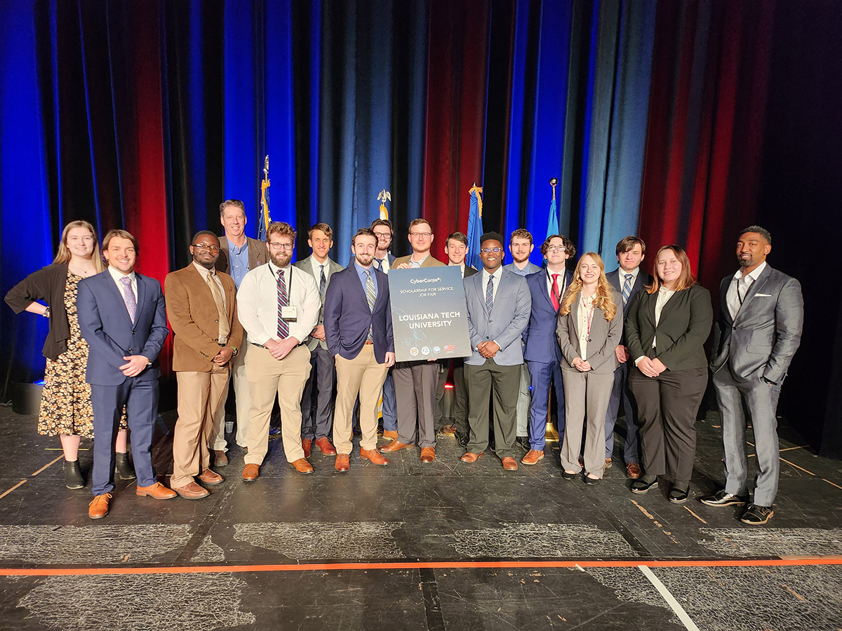 Summer 2023 Commencement Breakfast Louisiana Tech President Dr. Les Guice presenting COES Dean Emeritus Dr. Hisham Hegab with a plaque honoring his service to the University