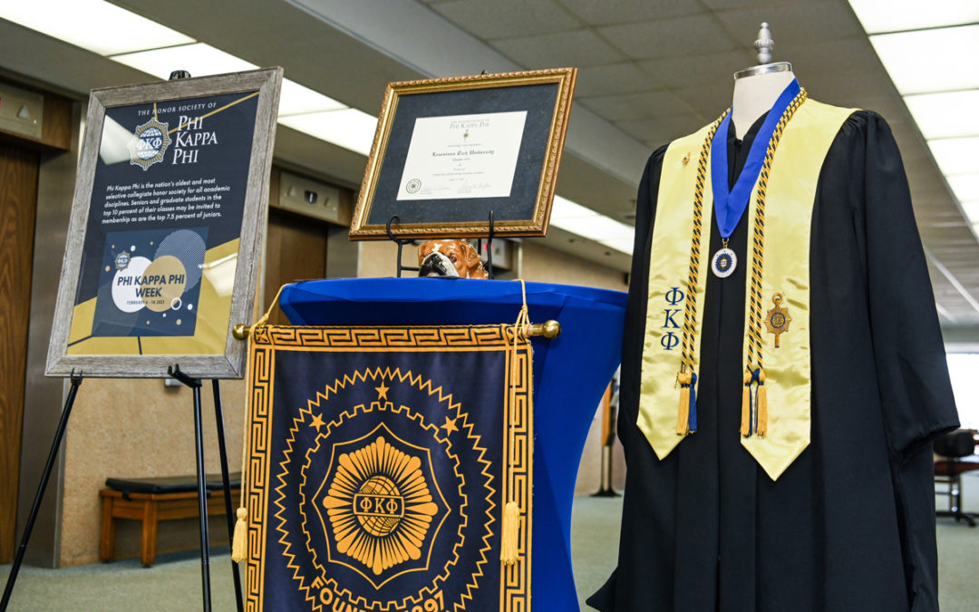 Prescott Memorial Library displays Phi Kappa Phi regalia